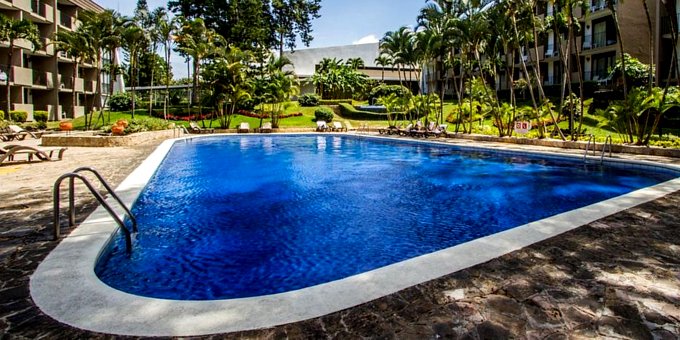 <p>Hotel Irazu and Studios in San Jose, Costa Rica, is a contemporary and convenient hotel that caters to both business and leisure travelers. Located just minutes from downtown San Jose and the Juan Santamaria International Airport (though traffic can be difficult at times), this hotel offers a convenient and comfortable stay. The spacious and well-appointed rooms provide a relaxing haven after a day of exploring the city or attending business meetings. Guests can enjoy a range of amenities, including an outdoor pool, fitness center, and on-site casino for entertainment. The hotel's on-site restaurant serves delicious local and international cuisine, and the bar is the perfect spot to unwind with a refreshing drink. With its central location, comfortable accommodations, and ample facilities, Hotel Irazu and Studios is a convenient choice for travelers looking for a comfortable stay in San Jose, Costa Rica. Hotel amenities include restaurant, bar, swimming pool, fitness center, business center, spa, tennis courts, laundromat, airport shuttle, and internet.</p>