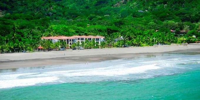 Bahia Azul Condominiums is a beachfront resort located in Jaco, Costa Rica. Nestled along the pristine Pacific Coast, the resort offers stunning ocean views and direct access to the sandy beach. The condominium units are spacious and tastefully furnished, providing a comfortable and relaxing environment for guests. Each unit features a fully equipped kitchen, a living area with modern amenities, and a balcony or terrace overlooking the ocean or the resort's lush gardens. Guests can enjoy the resort's outdoor swimming pool, sun loungers, and BBQ area, perfect for unwinding and soaking up the tropical vibes. The resort also offers secure parking and 24-hour security for peace of mind. With its prime location in Jaco, Bahia Azul Condominiums provides easy access to the town's attractions, including its vibrant dining and entertainment scene. Whether you're seeking relaxation or adventure, Bahia Azul Condominiums offers a memorable and enjoyable stay in Jaco. Hotel amenities include a swimming pool, concierge, and internet.