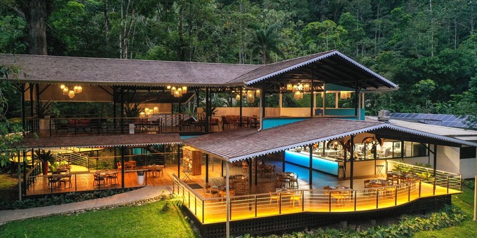 Nestled in the heart of the Costa Rican rainforest, Pacuare Lodge is a remarkable eco-lodge that offers a truly immersive and adventurous experience. Accessible only by a scenic river journey or a heavy-duty 4x4, this remote lodge provides a perfect blend of luxury and nature. The lodge features spacious and beautifully appointed bungalows and suites, providing guests with comfortable and cozy accommodations in a breathtaking setting. Surrounded by lush vegetation and the sounds of the jungle, guests can relax on their private terrace or take in the stunning views of the Pacuare River. The lodge offers a wide range of activities for nature enthusiasts, including thrilling whitewater rafting, guided hikes through the rainforest, birdwatching tours, and visits to local indigenous communities. For those seeking relaxation, there is a riverside spa where guests can indulge in rejuvenating treatments and massages. The dining experience at Pacuare Lodge is a highlight, with delicious gourmet meals made from locally sourced ingredients, often incorporating traditional Costa Rican flavors. The lodge is committed to sustainability and community engagement, implementing eco-friendly practices and supporting local initiatives. With its remote location, exquisite natural surroundings, and commitment to conservation, Pacuare Lodge offers a truly unforgettable and immersive experience in the heart of Costa Rica's pristine rainforest. Lodge amenities include a restaurant, bar, infinity lap pool, yoga platform and massage services. The minimum age for rafting is 12 years old and the minimum age to stay in the hotel is 7 years old. NOTE: River rafting may be canceled if river conditions are not safe.<p>
</p><strong>Your stay at the Pacuare Lodge also includes two activities per night of stay, per guest. These need to be arranged directly upon arrival at the lodge, with the concierge and are subject to availability. You will have the following options to choose from: Pacuare Canopy Adventure, Birdwatching Experience in Costa Rica's Rainforest, Canyoning -Tesorito Creek Experience, Cabecar Indigenous Hike, The Loop, Rural Experience, Ancient Trail & Hidden Waterfall Hike, and The Sustainable Tour.</strong><p></p>