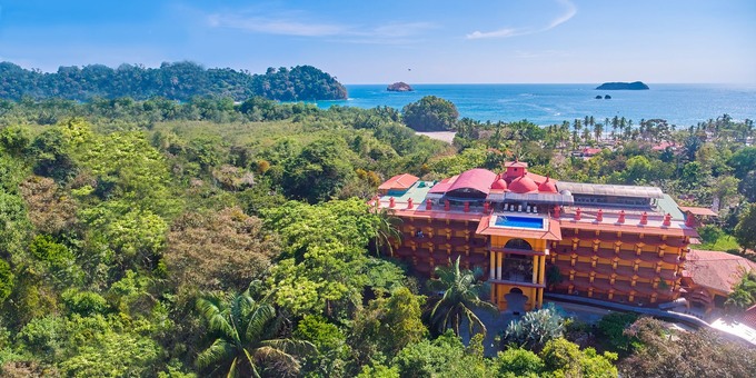 <p>Discover Hotel San Bada, an exceptional haven in Costa Rica's Central Pacific Region, nestled within the captivating Manuel Antonio area. This natural wonderland is renowned for its pristine beaches, lush forests, and abundant wildlife, epitomized by the Manuel Antonio National Park. Our privileged location places you a mere 1-minute walk to the national park, a 5-minute walk from the enchanting Playa Espadilla beach, and a short 15-minute drive from vibrant Quepos. Additionally, we own a splendid ranch, approximately 1.5 hours away, offering thrilling explorations of primary forests and mesmerizing waterfalls. Our main campus boasts breathtaking ocean and rainforest views and an array of amenities, including 3 swimming pools, a restaurant serving delectable cuisine, a fitness center, internet access, and a rejuvenating spa. Our thoughtfully designed accommodations feature furnished balconies, air conditioning, and modern conveniences. Hotel San Bada seamlessly combines natural beauty with modern amenities for an unforgettable experience, with proximity to the national park and beach ensuring endless adventure. Welcome to a place where comfort, convenience, and nature converge for an extraordinary stay.</p>