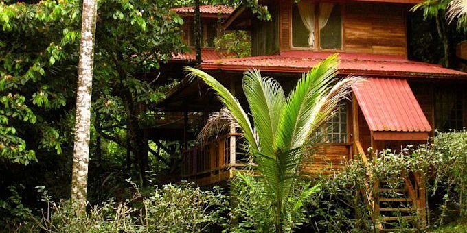 Samasati Nature Retreat, 20 minutes drive from Puerto Viejo, Costa Rica, is a hidden gem nestled in the heart of the rainforest. This eco-conscious retreat offers a transformative experience, allowing guests to reconnect with nature, rejuvenate their spirits, and find inner peace. Stay in rustic yet comfortable accommodations, surrounded by the lush jungle and breathtaking views. Immerse yourself in holistic wellness with yoga and meditation classes, indulge in nourishing organic cuisine, and unwind with healing massage and wellness treatments. Explore the enchanting trails, encounter diverse wildlife, or take a short drive to the nearby pristine beaches. With its commitment to sustainability, serene ambiance, and focus on wellness, Samasati Nature Retreat provides a sanctuary where guests can embark on a journey of self-discovery and embrace the natural beauty of Puerto Viejo, Costa Rica. Lodge amenities include restaurant, massage service, yoga area, beach shuttle, and jacuzzi.