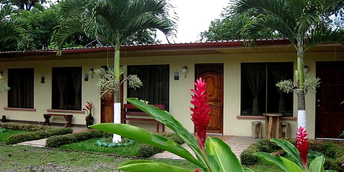 Hotel Lavas del Arenal in La Fortuna, Costa Rica, is an affordable and comfortable hotel situated in the countryside of the majestic Arenal Volcano region. The hotel offers clean and cozy rooms at affordable rates, making it a great choice for budget-conscious travelers. The rooms are equipped with essential amenities to ensure a pleasant stay. Guests can enjoy beautiful views of the volcano and surrounding lush greenery from the hotel's outdoor terrace. The hotel's friendly staff are ready to assist with any inquiries or requests, ensuring a warm and welcoming experience for guests. Its convenient location provides reasonable access to popular attractions in La Fortuna, including hot springs and adventure activities. For travelers seeking affordable accommodations, Hotel Lavas del Arenal offers a comfortable and budget-friendly option in La Fortuna. Hotel amenities include restaurant, swimming pool, and free wireless internet.  In tropical fashion, no rooms offer television.