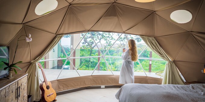 Chira Glamping Lodge in Monteverde, Costa Rica offers a unique and immersive glamping experience amidst the beauty of the cloud forest. Surrounded by nature, guests can enjoy comfortable and stylish accommodations in the form of tents, yurts, and pods while being close to the area's renowned attractions. The lodge provides a blend of modern amenities and a connection with the natural environment, allowing visitors to relax and unwind in a serene setting.