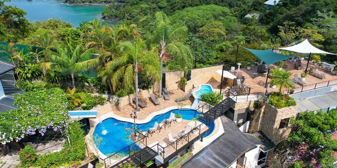<p>Escape to the idyllic paradise of Layan Hotel And Spa, nestled in the stunning Manuel Antonio region of Costa Rica. Situated on a picturesque hillside overlooking the sparkling Pacific Ocean, our resort offers a serene and luxurious retreat. Immerse yourself in the natural beauty of the surroundings as you relax in our spacious and exquisitely designed accommodations. Each room combines contemporary elegance with tropical charm, providing a sanctuary of comfort and tranquility. Whether you're lounging by the inviting swimming pool, enveloped by lush gardens or exploring the pristine beaches of Manuel Antonio, you'll be surrounded by breathtaking vistas and a sense of serenity. For adventure seekers, the nearby rainforests and national parks offer endless opportunities to discover the wonders of Costa Rica's diverse ecosystem. Alternatively, simply unwind on your private balcony, savoring the mesmerizing sunset views. At Layan Hotel and Spa, our commitment to exceptional service, world-class amenities, and sustainability ensures a truly remarkable and unforgettable stay. Indulge in delectable cuisine at our restaurant and bar, unwind in the inviting lounge area, and stay connected with complimentary WiFi available in select public areas. Note that spa/massage services are provided in the privacy of your room. Your journey to paradise begins here. <strong>Layan is positioned on top of a rainforest-covered hill and is not within walking distance of the beach.</strong></p>
<p><strong>Plus, when you book your vacation through us, you'll enjoy an extra treat: a special 15% discount on in-room massage treatments, enhancing your Costa Rican getaway. This offer is only available to Pacific Trade Winds clients!</strong></p>