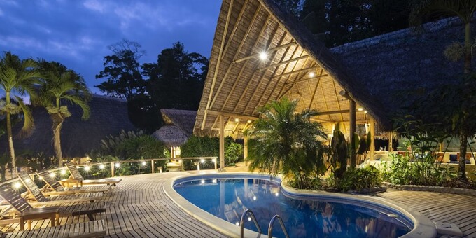 <p>Nestled within Costa Rica's pristine Osa Peninsula, Bosque del Cabo Lodge is a premier ecolodge, encompassing 750 acres of private rainforest reserve and offering a remarkable blend of sustainable luxury and immersion in nature. Located in Cabo Matapalo, this lodge serves as a gateway to the captivating Corcovado National Park. Accommodation options range from rustic yet elegant thatched-roof bungalows to ocean-view cabins and treehouses that provide a unique rainforest experience. Embracing eco-conscious practices, the lodge boasts trails for wildlife viewing, featuring toucans, scarlet macaws, monkeys, and sloths. Corcovado National Park beckons with its rich biodiversity and cascading waterfalls, and dining at the lodge's restaurant offers fresh, locally-sourced cuisine paired with breathtaking ocean views. A stay at Bosque del Cabo Lodge is an unforgettable journey into the heart of nature, where luxury and conservation harmoniously coexist. Lodge amenities include a swimming pool, restaurant, bar, yoga platform, nature trails, and internet.</p>