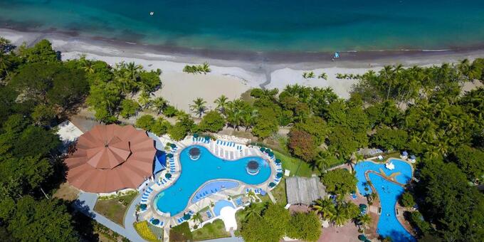 Experience the best of beachfront paradise and immersive nature at Hotel Punta Leona Beach and Nature Resort in Herradura, Costa Rica. Surrounded by lush tropical rainforest and pristine beaches, our well-appointed accommodations offer a serene haven to unwind and connect with nature. Explore the natural beauty through recreational activities and eco-adventures, relax on the sandy shores, and take refreshing dips in crystal-clear waters. Indulge in diverse culinary delights with breathtaking ocean views, rejuvenate with spa treatments, and enjoy resort amenities including pools and tennis courts. With personalized service and a commitment to creating unforgettable experiences, Hotel Punta Leona Beach and Nature Resort invites you to discover the perfect blend of relaxation and adventure in Herradura, Costa Rica. Hotel amenities include a swimming pool, restaurant, bar, spa, nature trails, mini golf, volleyball, and internet.