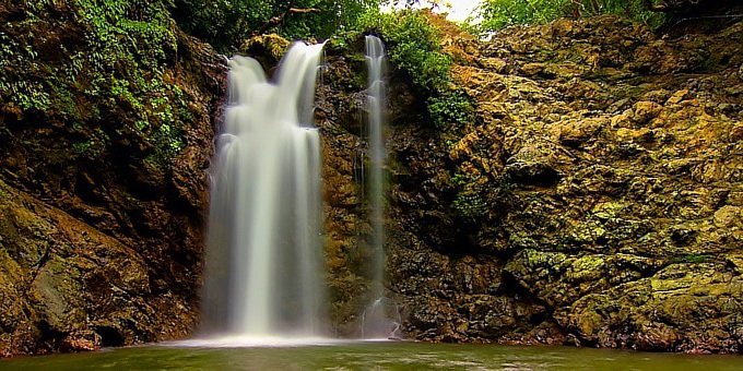 Known for its Bohemian atmosphere, the small beach village of Montezuma attracts artists, beach lovers, and backpackers from all over the world. Here you can gallop horses down the beach to an amazing waterfall and stop to take a fresh water swim in a rock grotto.